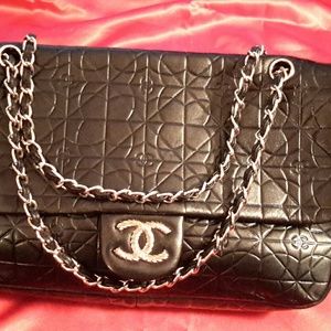 Designer inspired black leather shoulder bag.